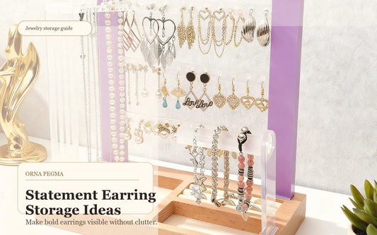 Statement earrings displayed on an Orna Pegma jewelry organizer stand
