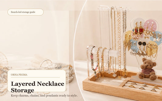Layered necklaces and charm jewelry displayed on an Orna Pegma organizer