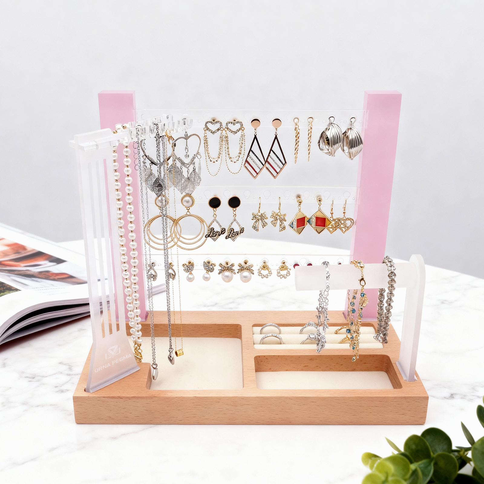 Jewelry organizer with various earrings on a white background