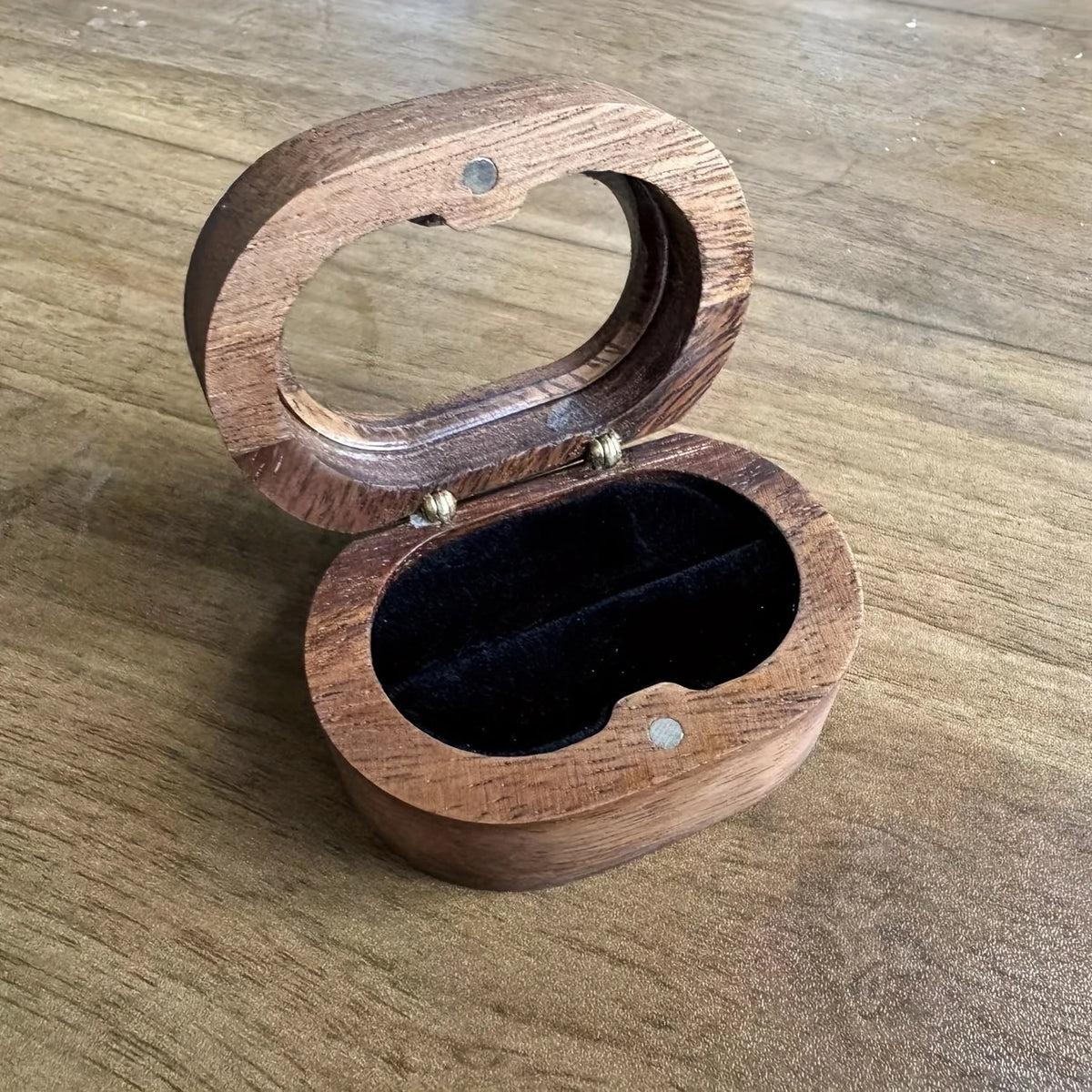 Black walnut oval jewelry box — main view