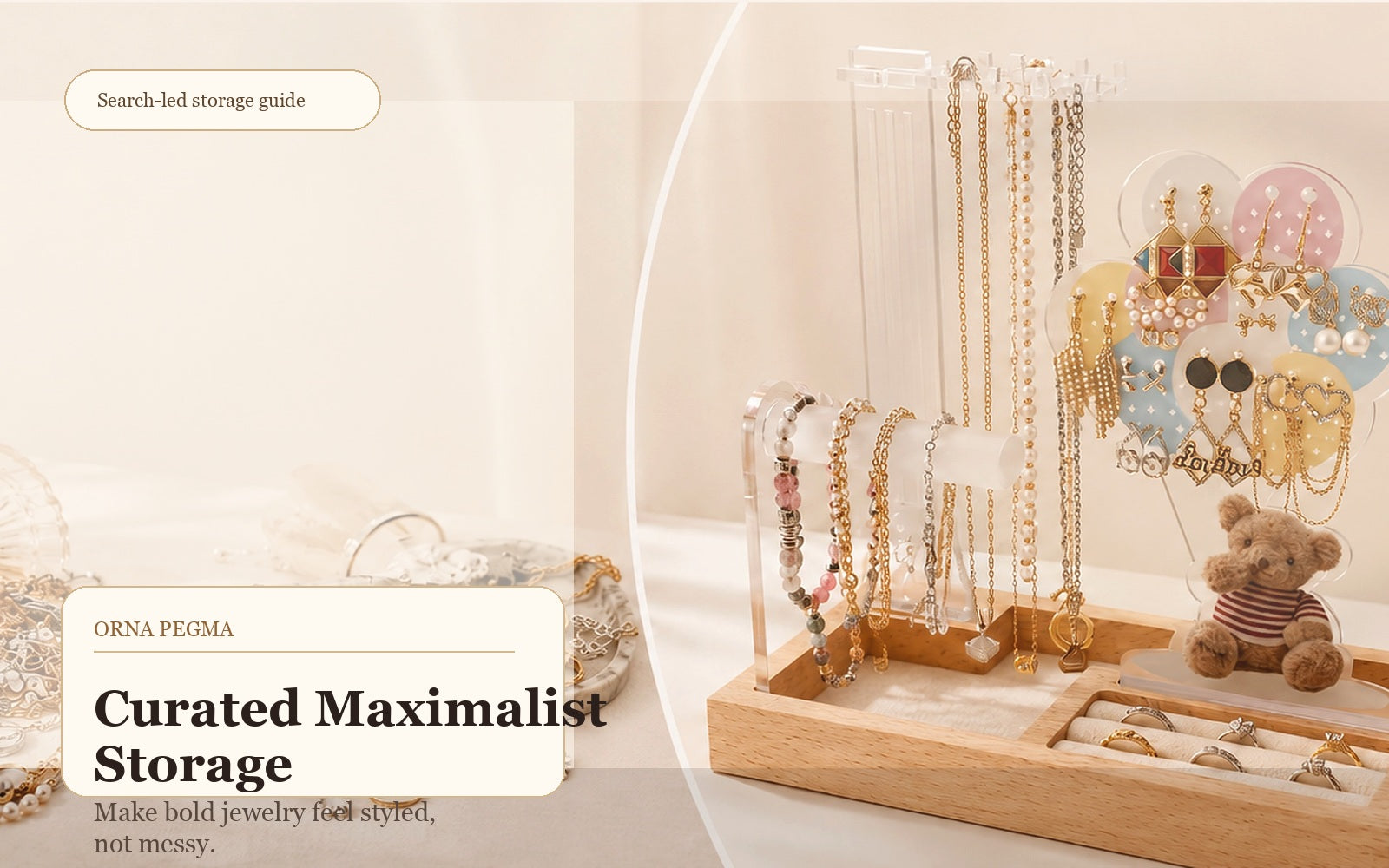 Curated maximalist jewelry displayed on an Orna Pegma organizer with earrings and necklaces visible
